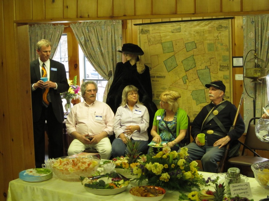 Business owners and Civil War soldiers enjoying the Chamber's business after hours.
